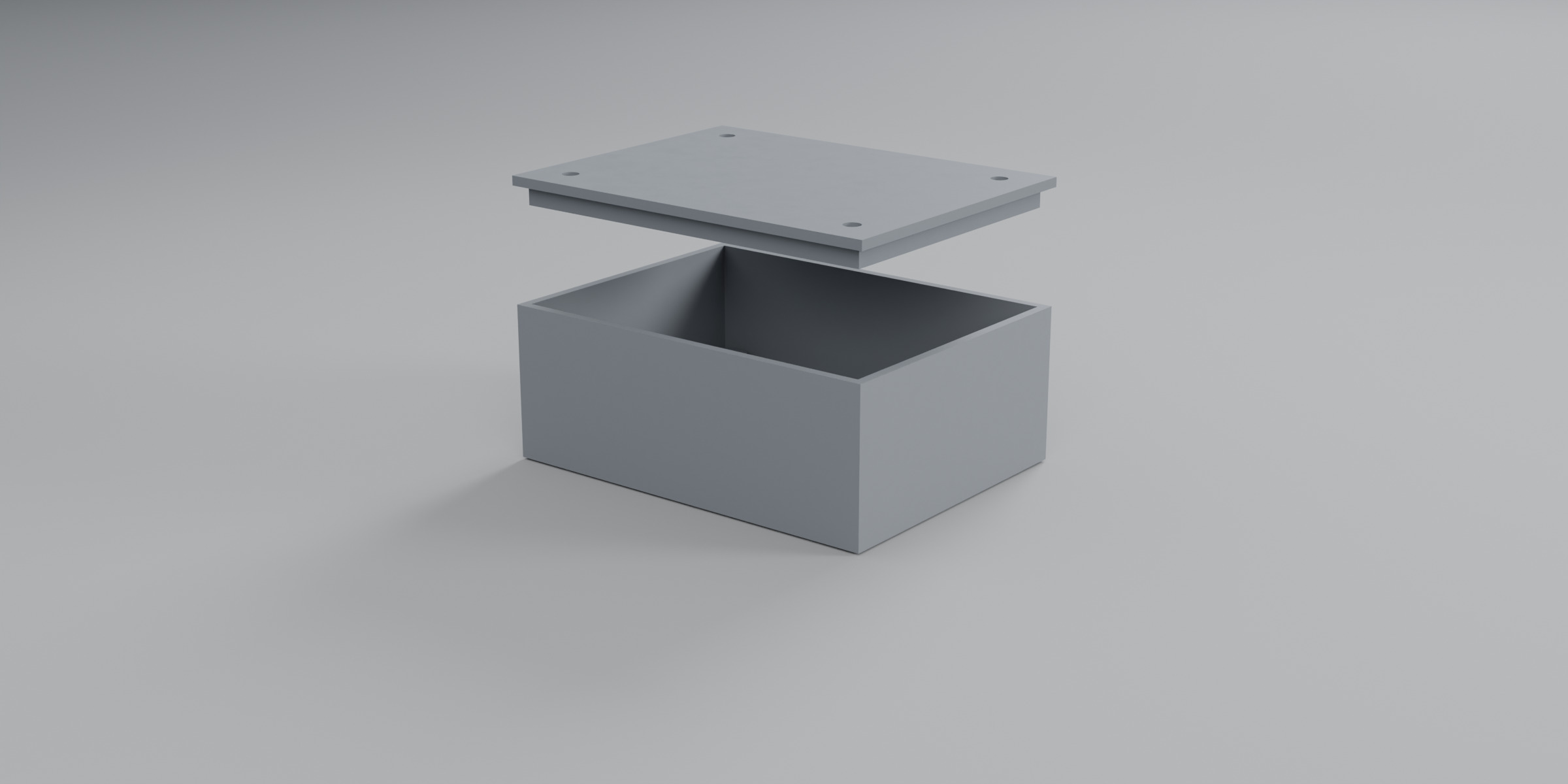 Body and lid separated vertically, showing the nesting lip and aligned screw holes.