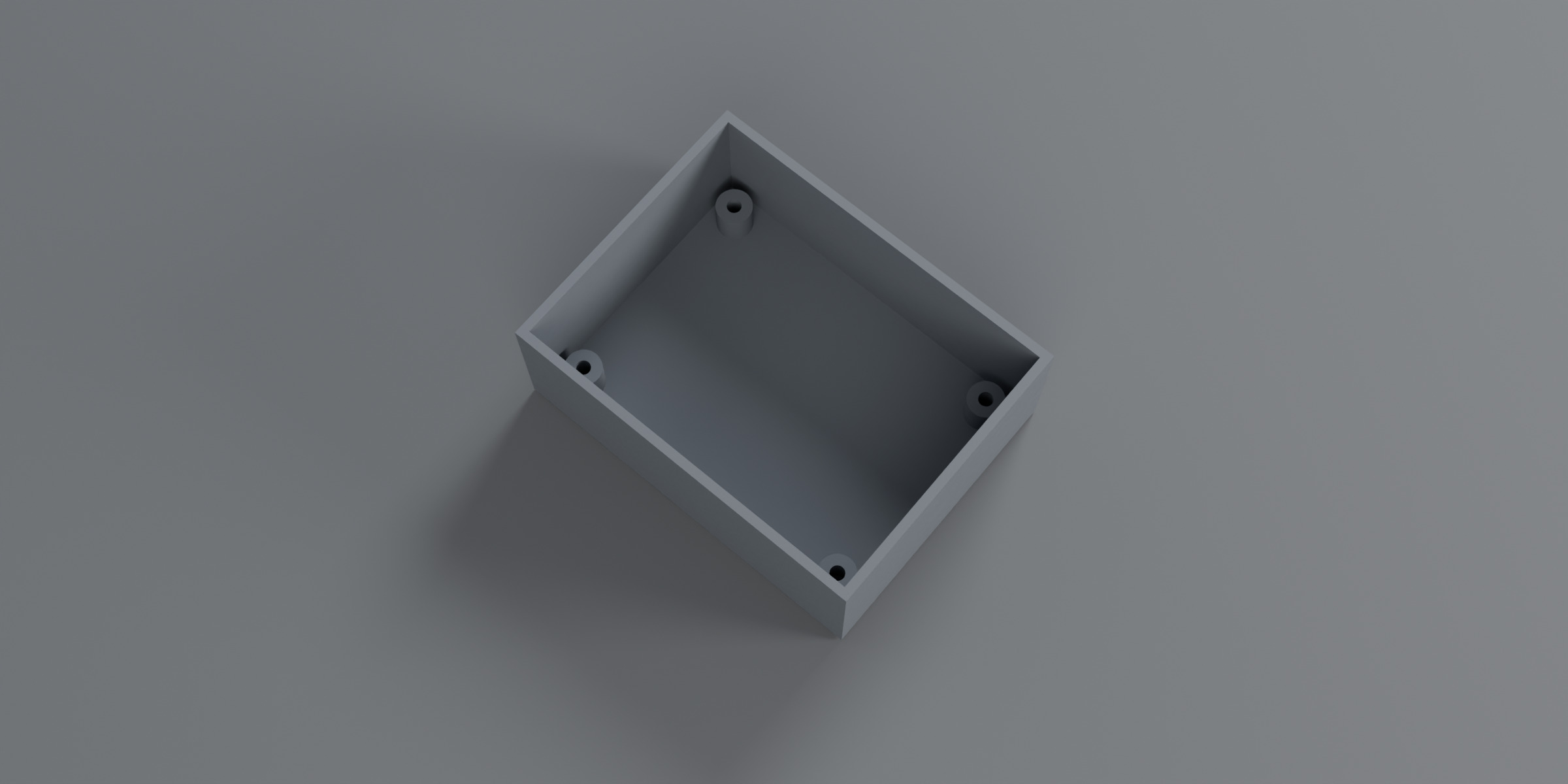 Open body showing four corner screw bosses on the floor.