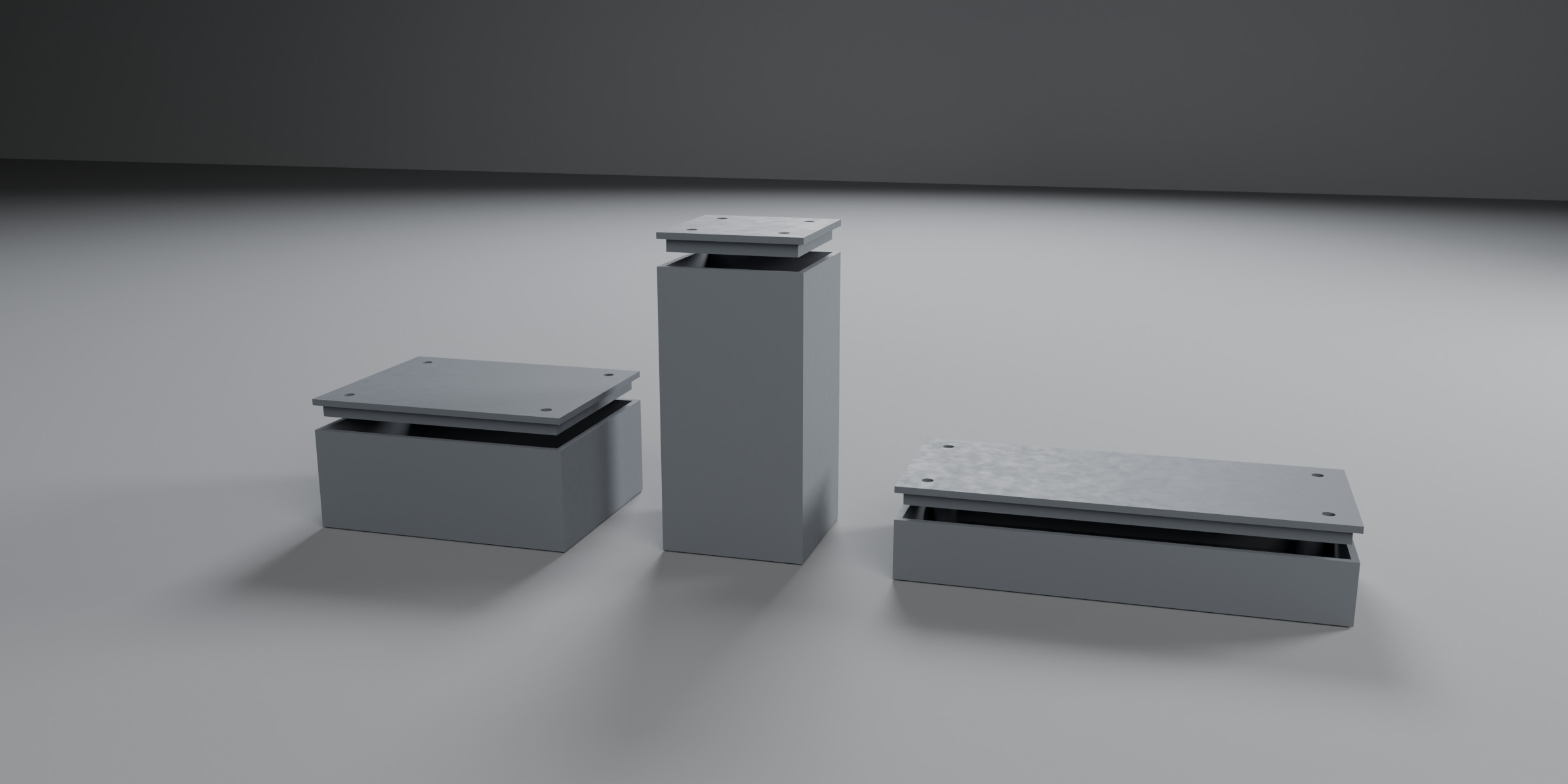 Three project boxes of different proportions standing side by side.